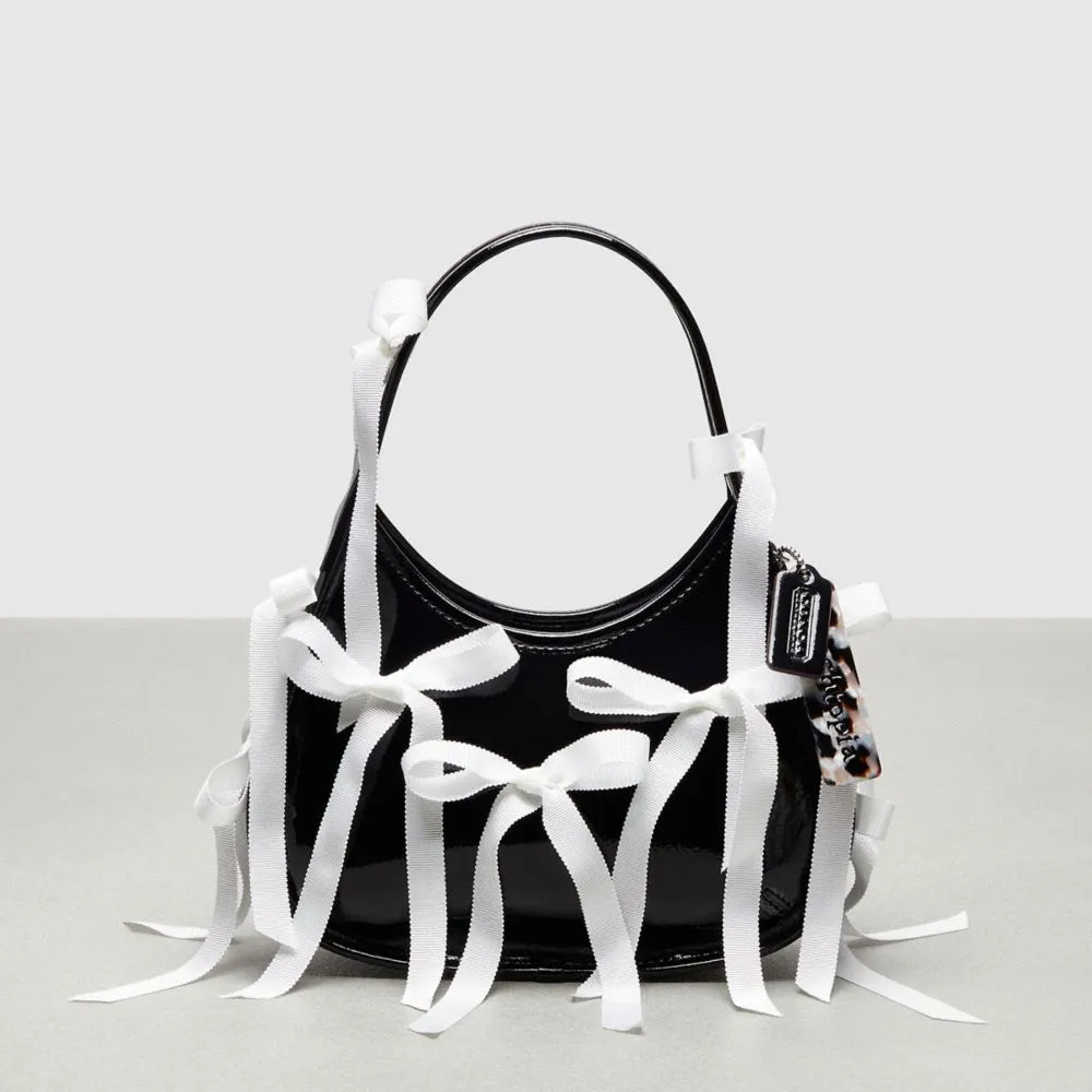 Ergo Bag In Crinkle Patent Coachtopia Leather With Allover Bows